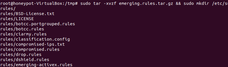Descomprimiendo las reglas de Suricata y moviéndolas al directorio /etc/suricata/rules