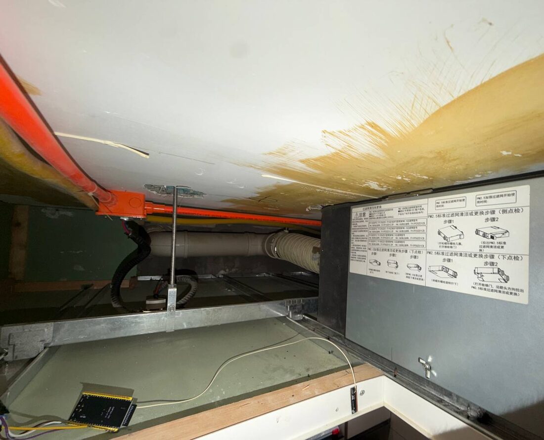 ESP32 wired into the ERV's CN12 in the ceiling