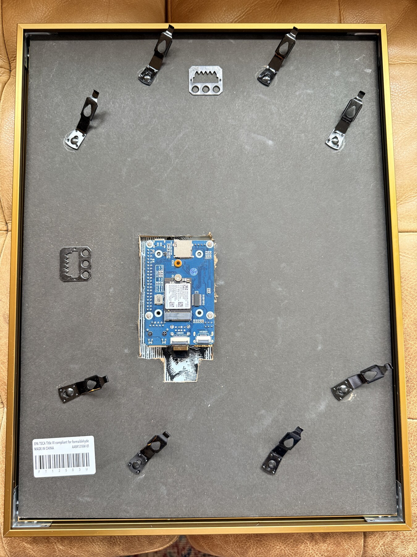 Rear backing board cut around the CM4 carrier in the assembled frame